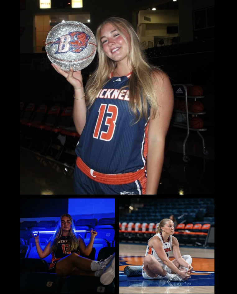 Female basketball player proudly holding a basketball in her team jersey.